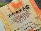 Cha-ching! 3 tickets share $448M lotto jackpot