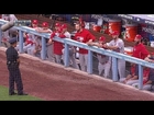 Cardinals' dugout try to make cop laugh