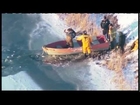 Dog rescue, Firefighters rescue a dog from a frozen lake